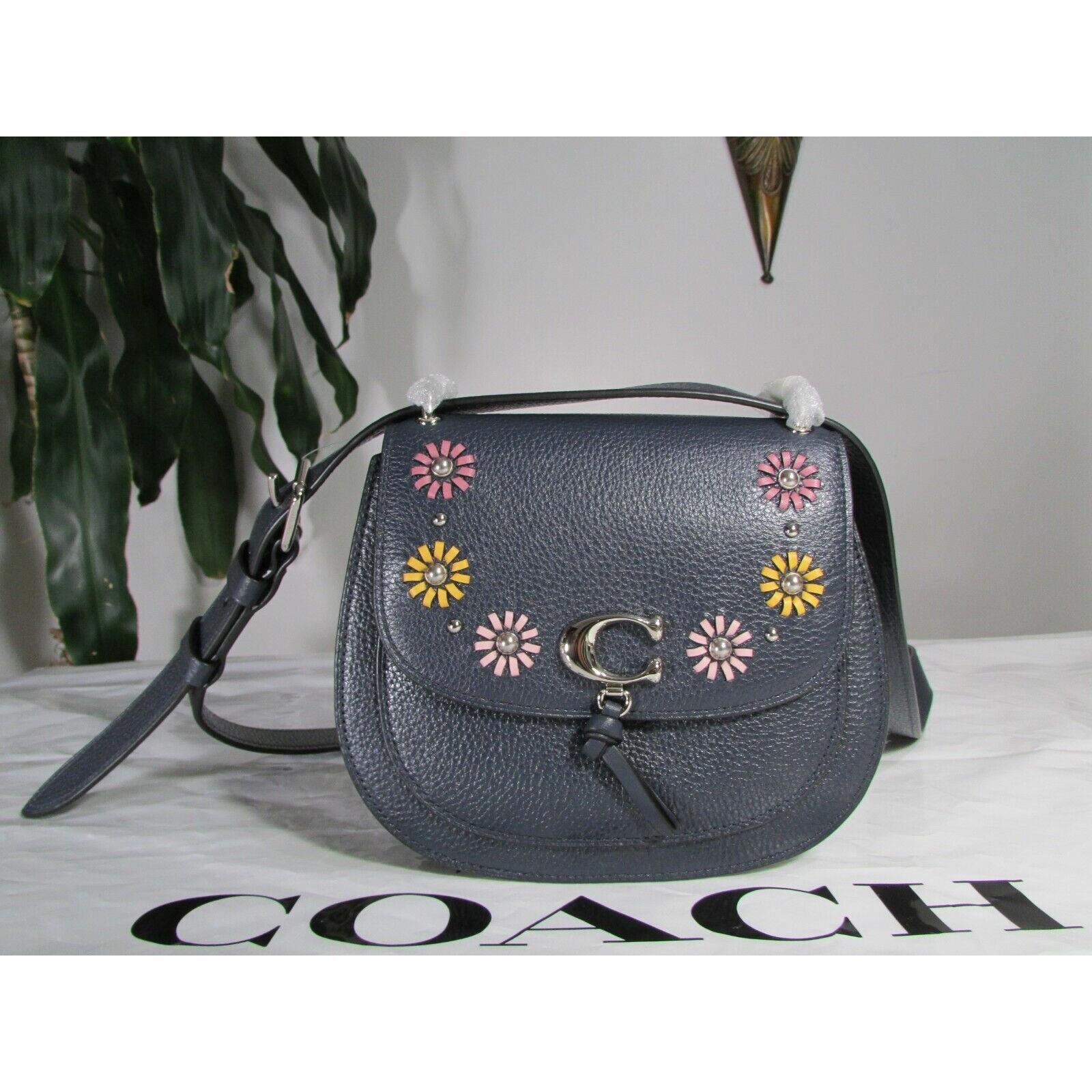 remi saddle bag with whipstitch daisy applique