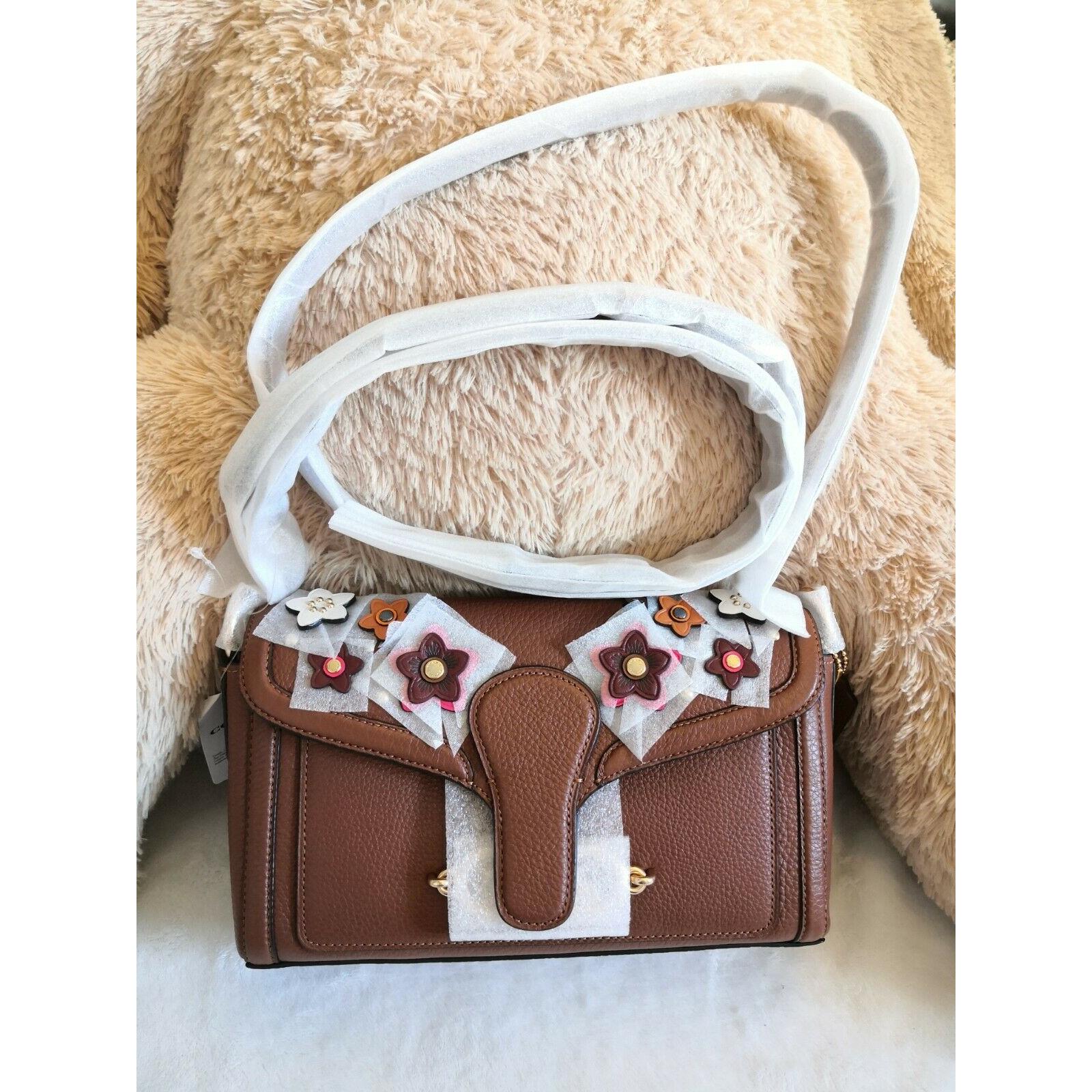 jade shoulder bag with daisy applique