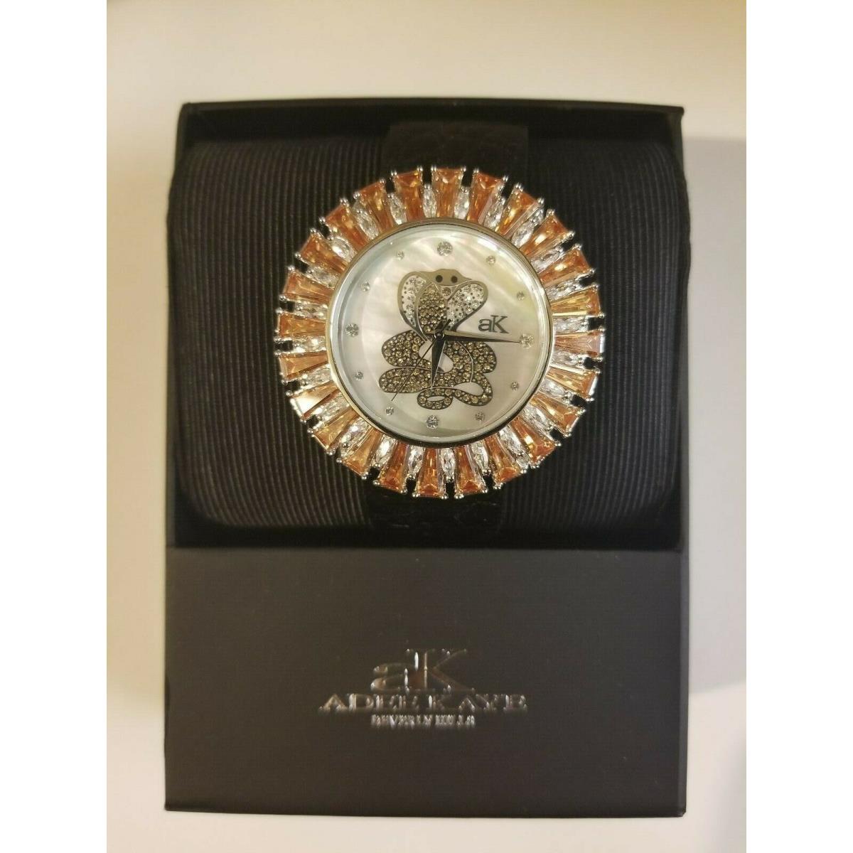 Cobra in Mother of Pearl Dial Watch by Adee Kaye with Yellow Austrian Crystals