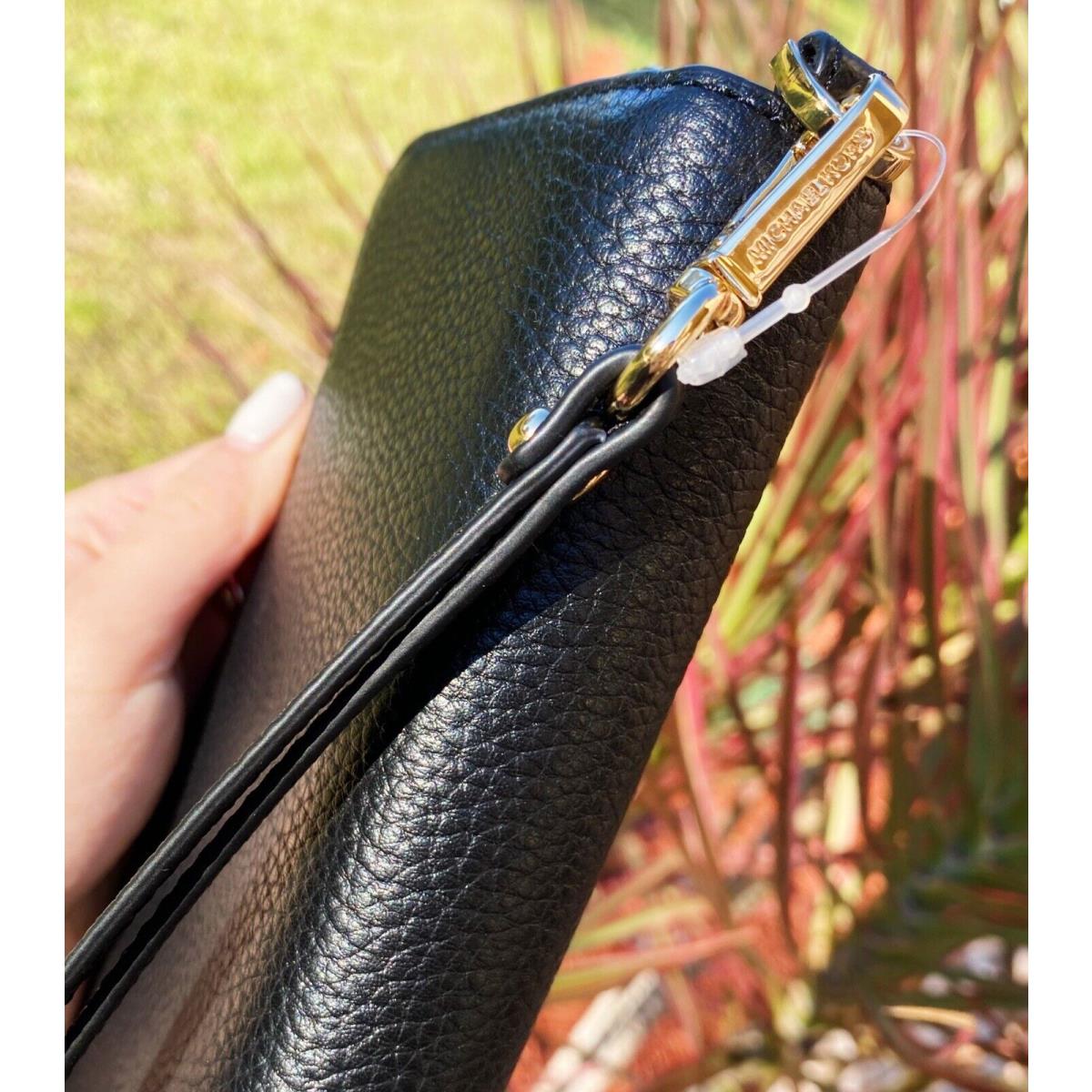 Michael Kors Jet Set Travel Large Flat Zip MF Phone Case Wristlet Wallet  Black - Michael Kors wallet - 192877339588 | Fash Brands
