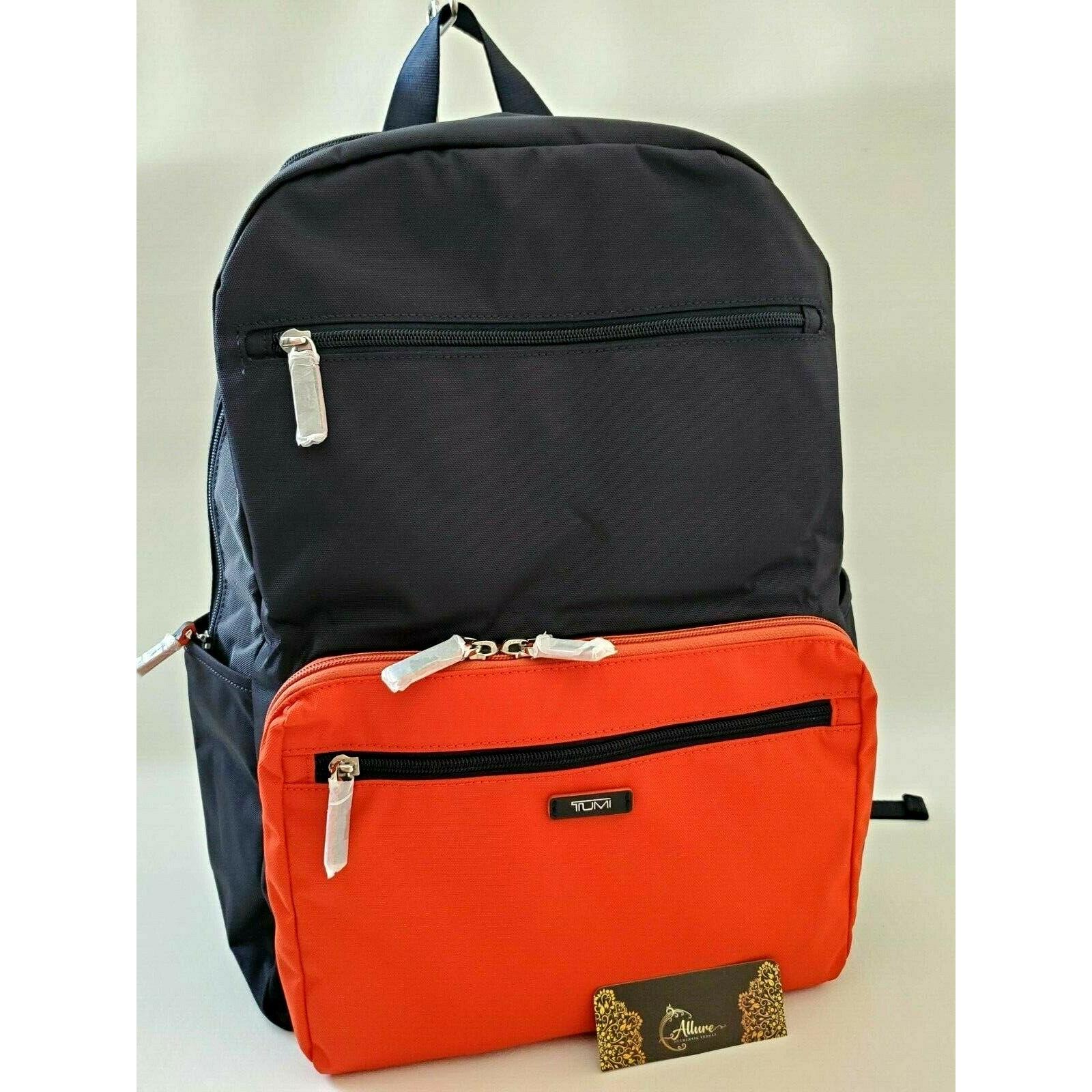 tumi red backpack
