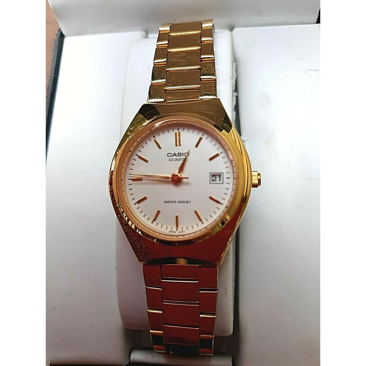 Casio Women`s Gold Plated Date Quartz Fashion Classic Analog Watch LTP-1170N-9A - Dial: White, Band: Yellow Gold