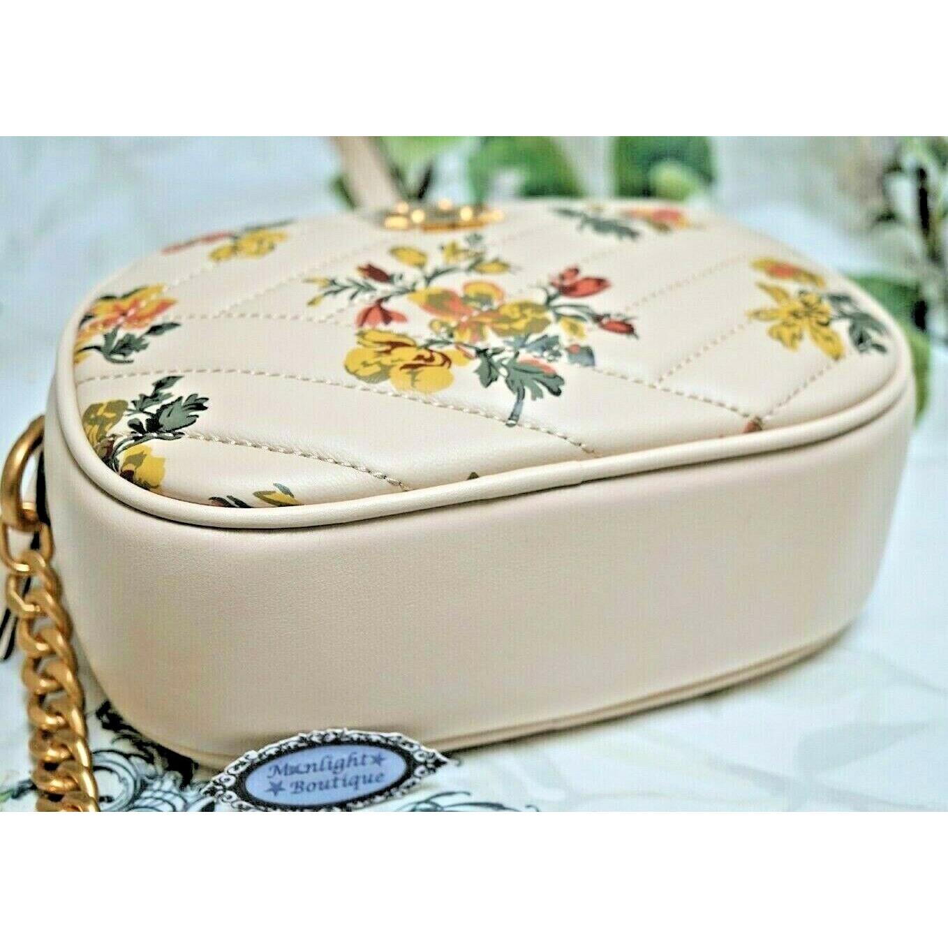 kira chevron floral camera bolsa