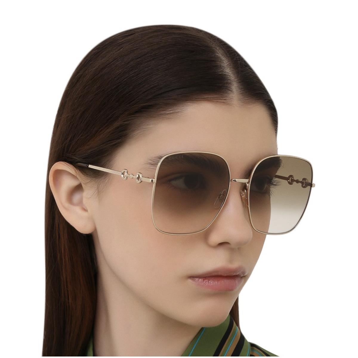 Gucci GG0879S-002-61 Gold Sunglasses