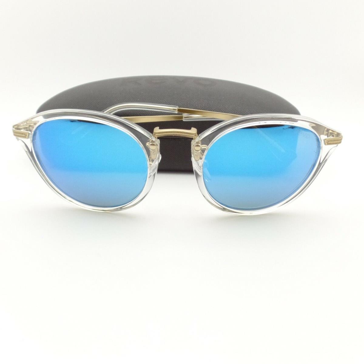 Revo sunglasses Quinn - Crystal Pale Gold Filigree Frame, Blue Water Lens