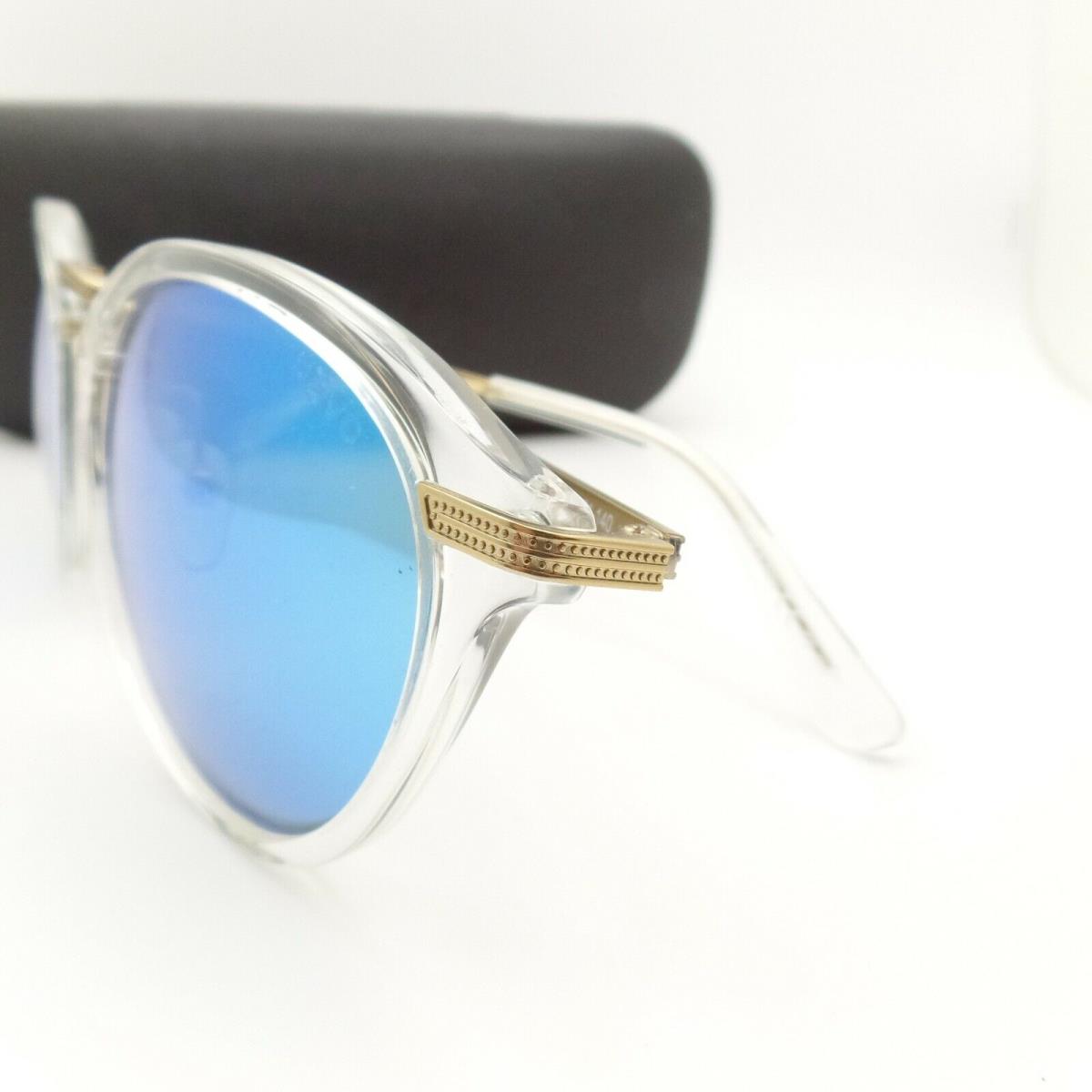 Revo sunglasses Quinn - Crystal Pale Gold Filigree Frame, Blue Water Lens