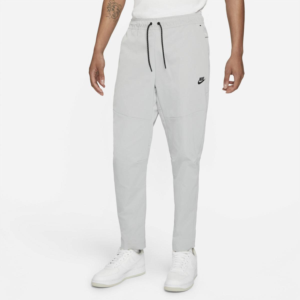 Nike Sportswear Tech Woven Pants CU4483-077 Tapered Stone Light Grey Black Pack