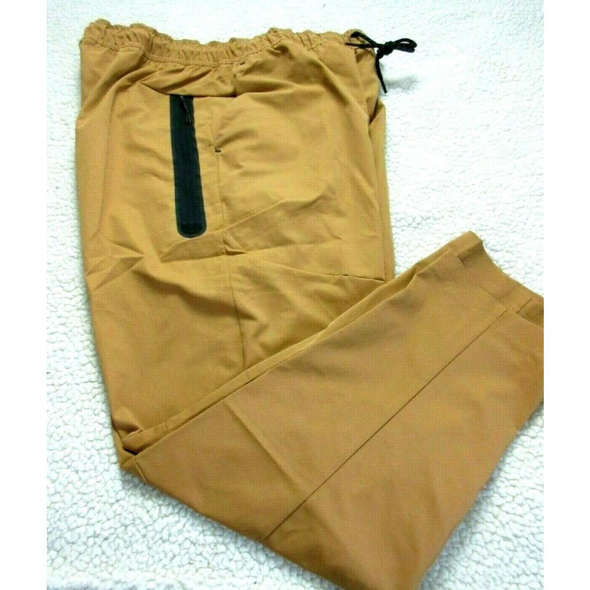 Nike clothing Sportswear Pants - Brown/Black , Flax/Black Manufacturer 0