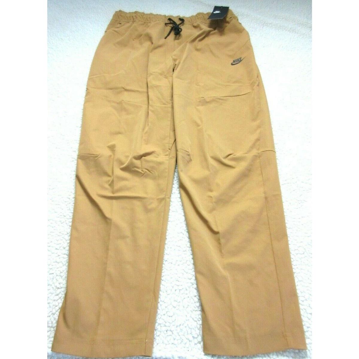 Nike clothing Sportswear Pants - Brown/Black , Flax/Black Manufacturer 1