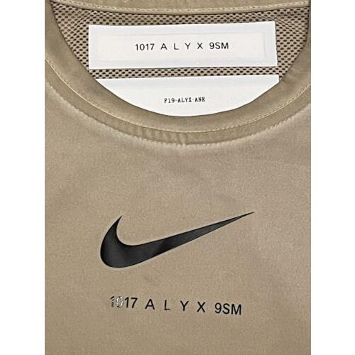 tan nike clothing