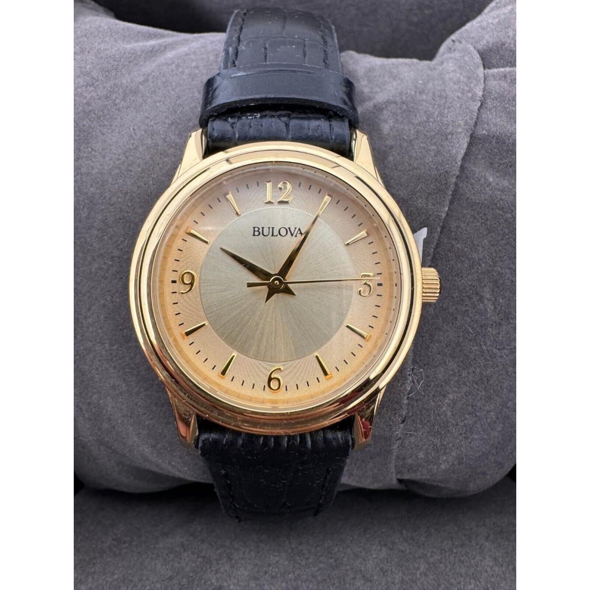 Bulova 97V25 Gold Tone Round Women`s Watch Black Leather Strap W/box