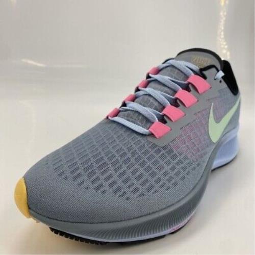 gray blue and pink nike shoes