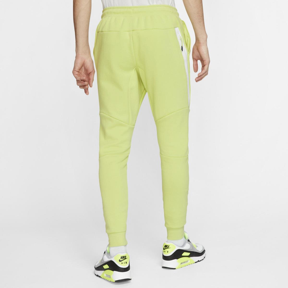 lime green nike tech pants