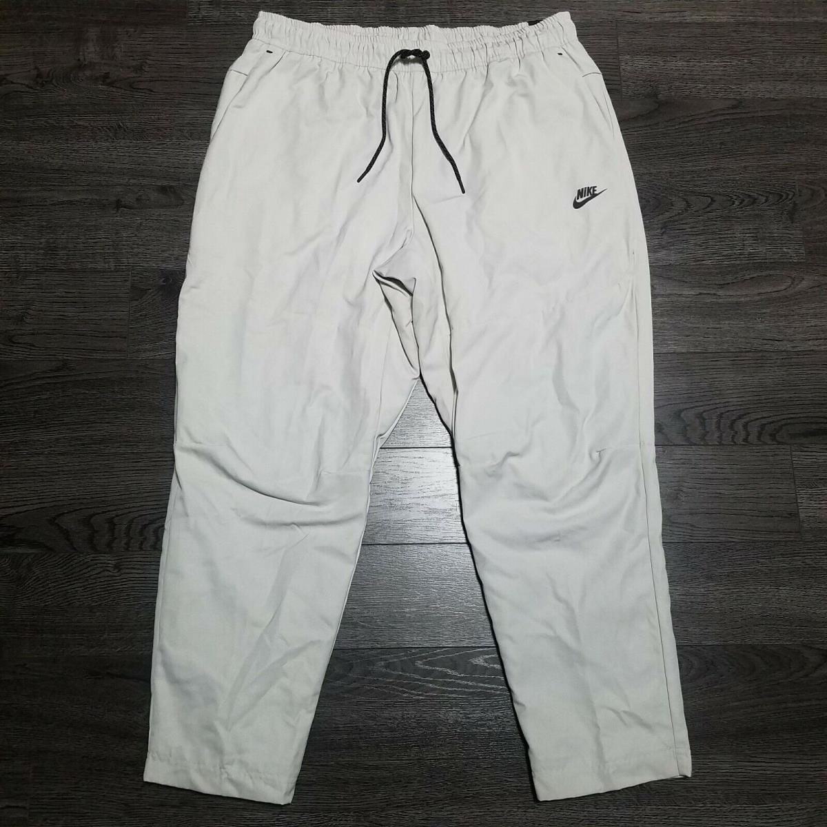 Nike Sportswear Woven Repel Tech Pants Mens 2XL Bone Water Repellent Joggers