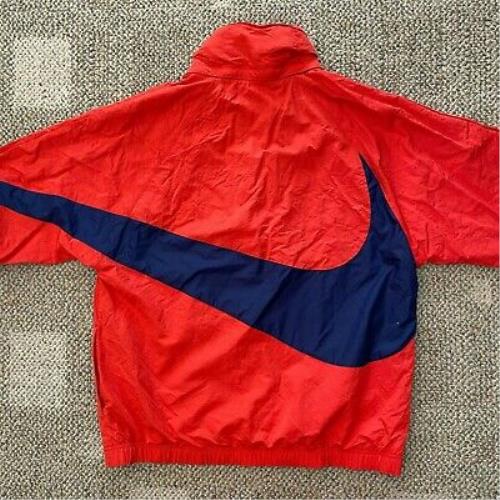 red and navy blue nike windbreaker