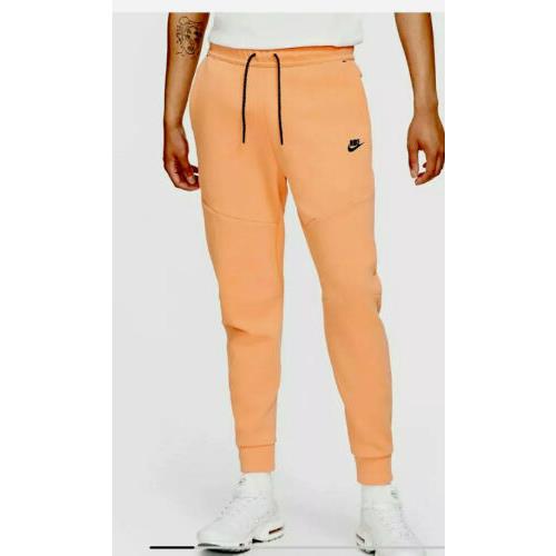 nike sweat pants orange