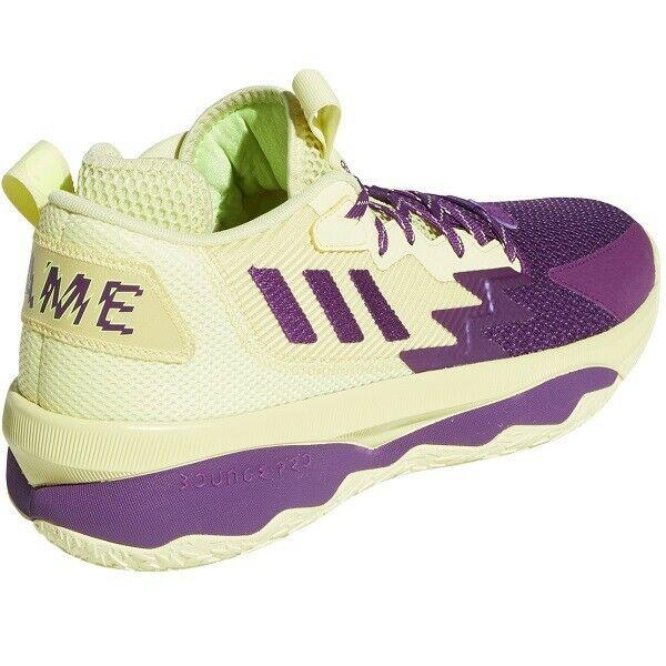 purple and green adidas shoes