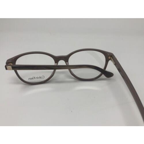 Calvin Klein eyeglasses  - Frame: Brown 9