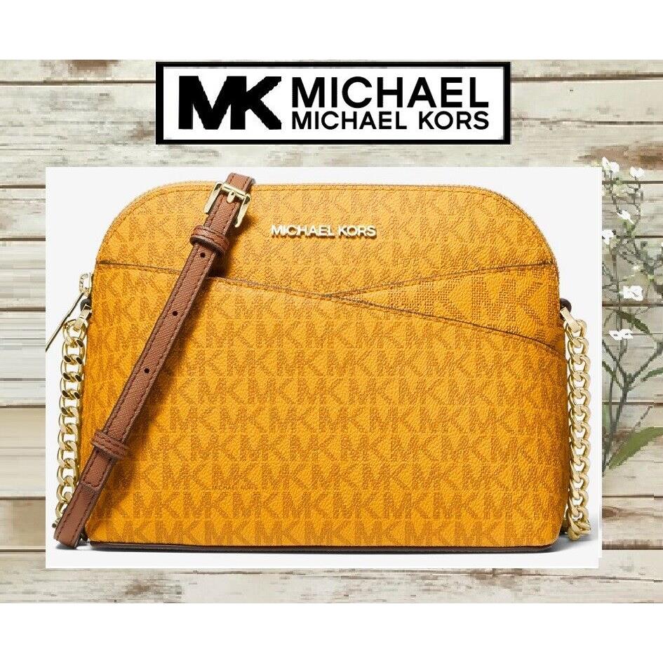 Michael Kors Jet Set Travel Medium Dome Xcross Crossbody Bag In Marigold  Sig - Michael Kors bag - 194900656457 | Fash Brands