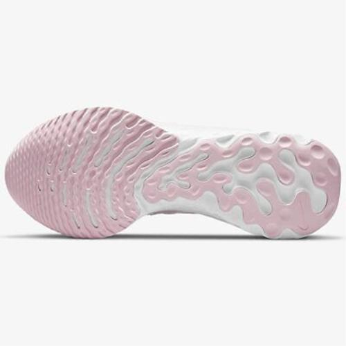 pink nike shoes with clear bottom