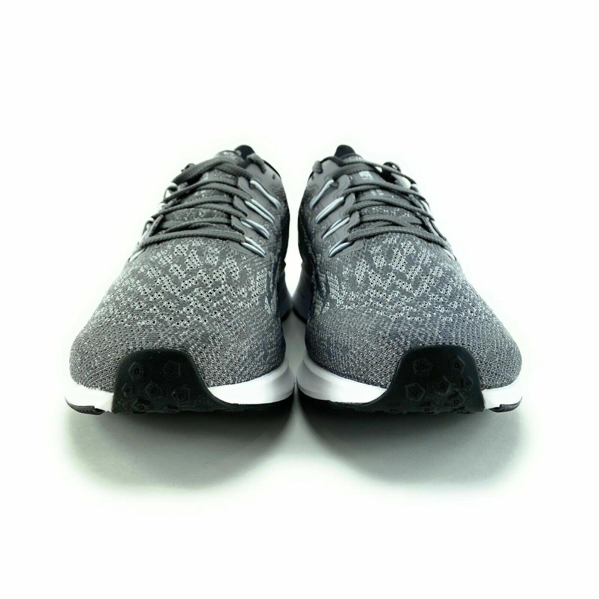 grey speckled nike shoes