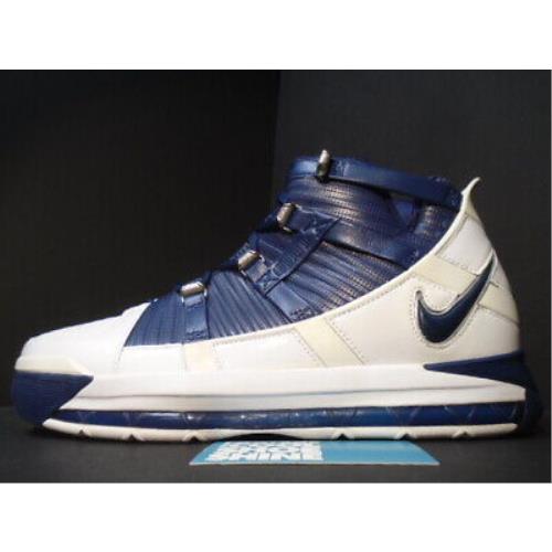 navy blue and white lebrons