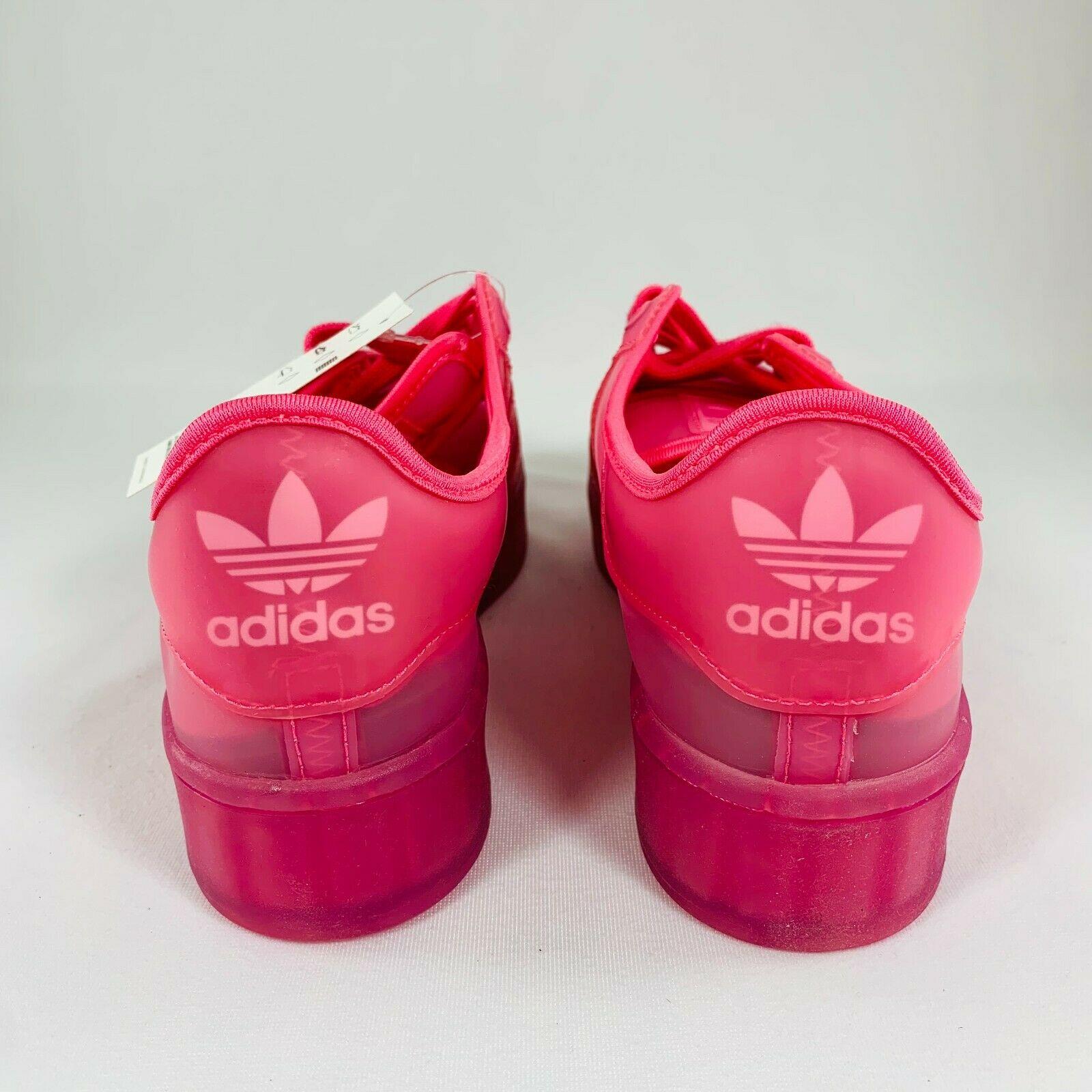 red and pink adidas shoes