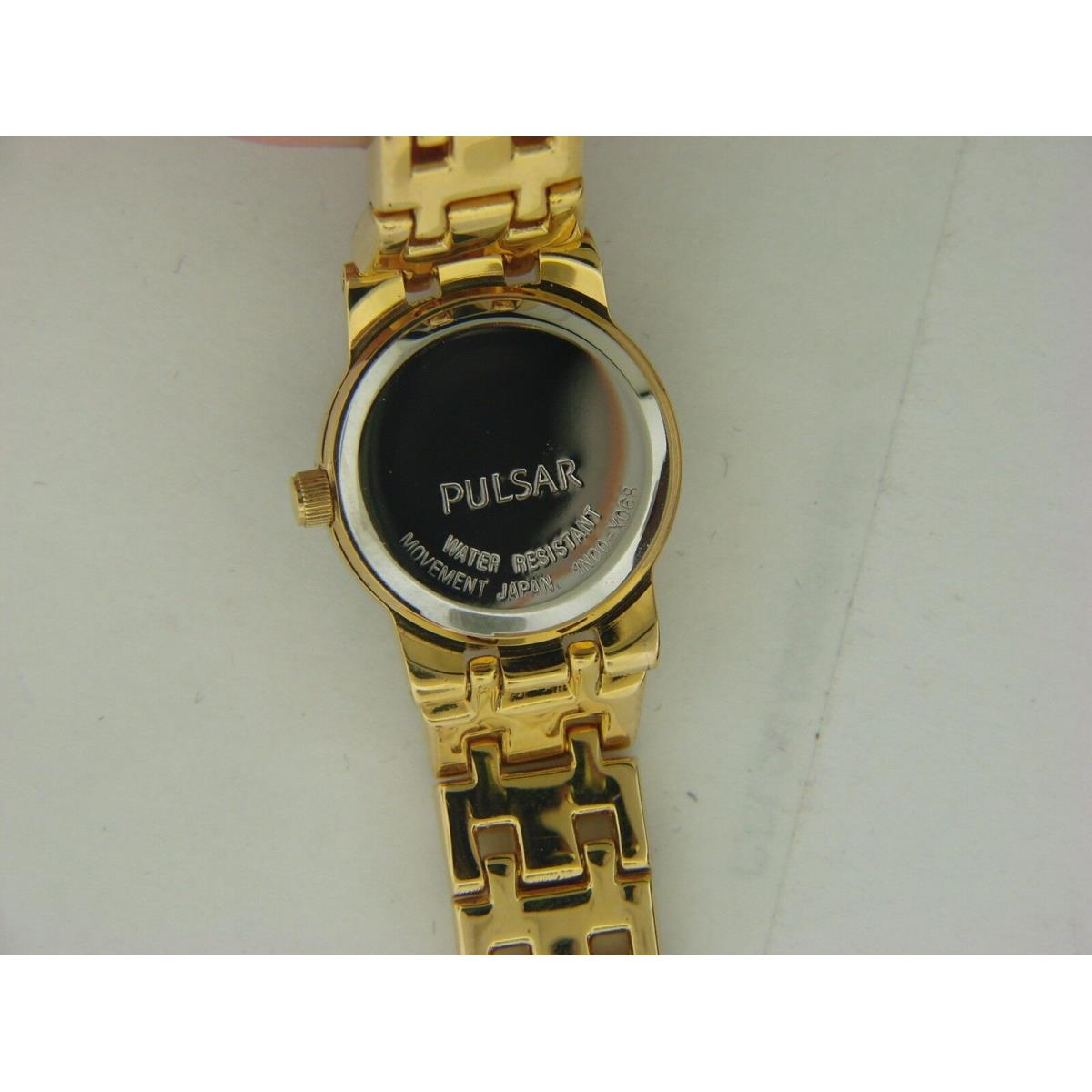 Pulsar Women`s Gold Tone Watch W/ Mirrored Bezel PEG506