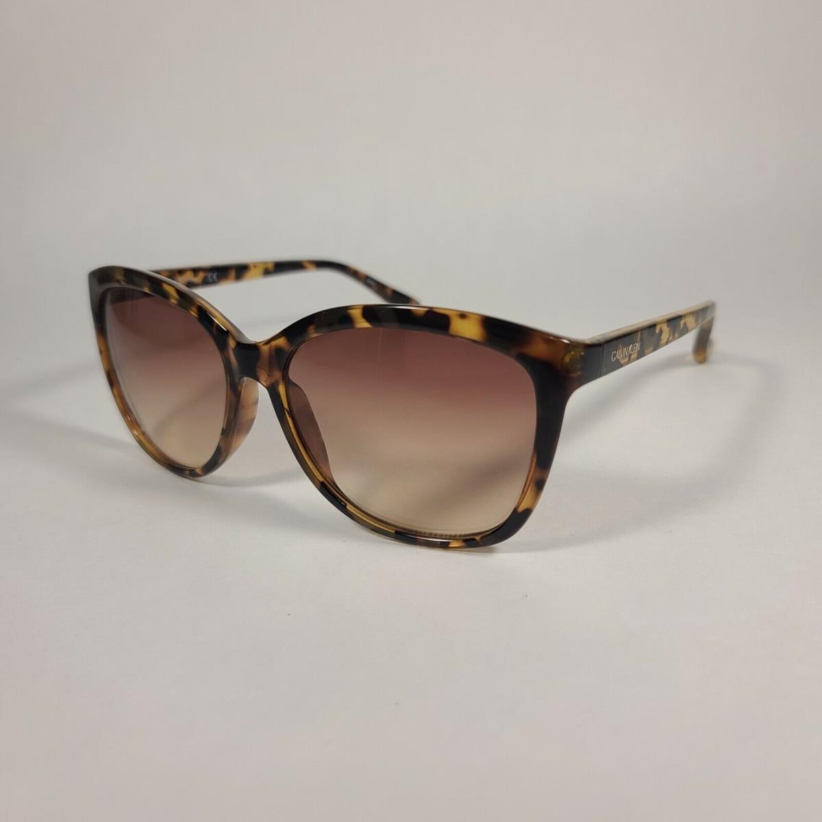 Calvin Klein Women`s CK19542S 235 Cat Eye Sunglasses Tortoise Brown Gradient