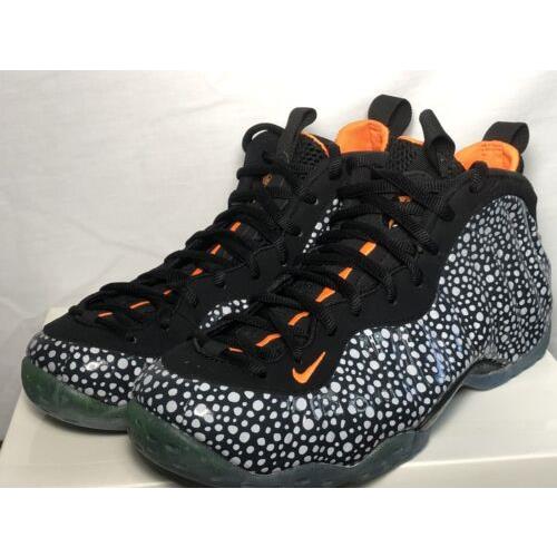 orange and black nike foams