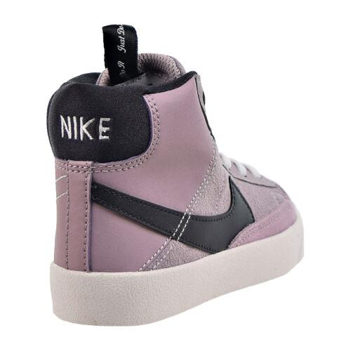 pink high top nike sneakers