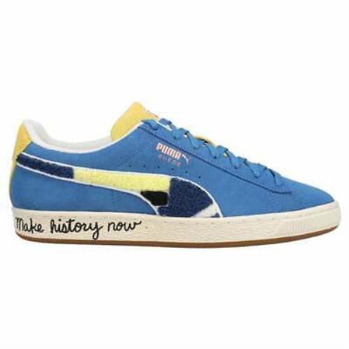 blue and yellow puma trainers