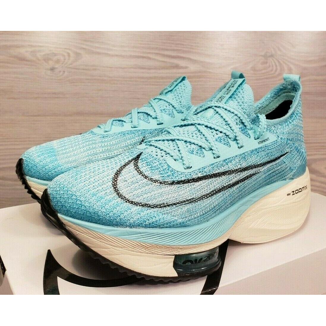 turquoise and white nike shoes