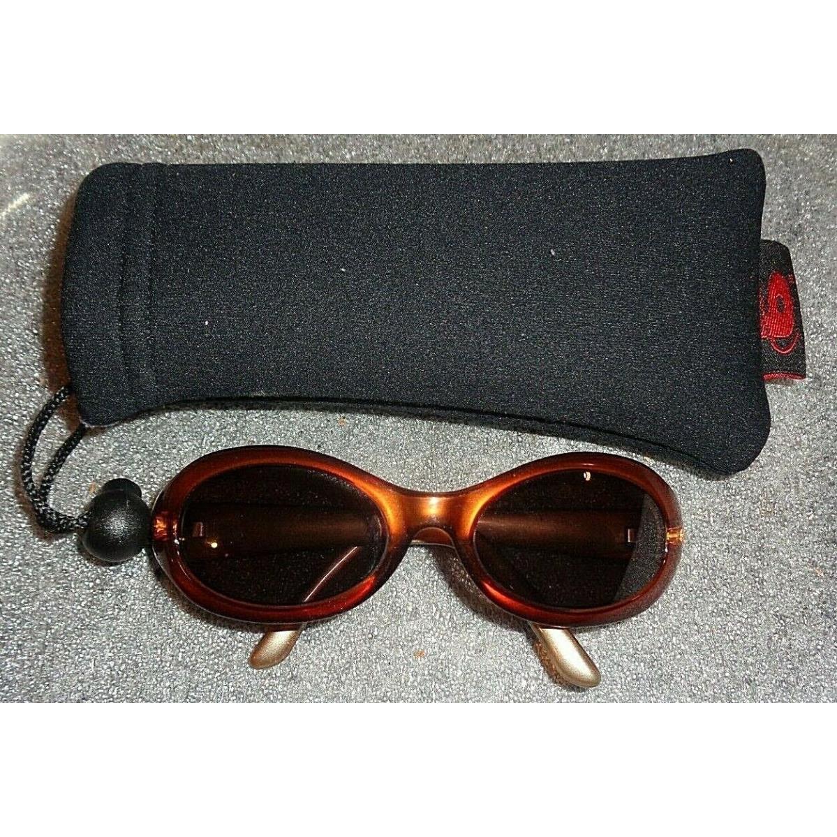 Pair Women`s Bolle Cased Honey Frame Sunglasses