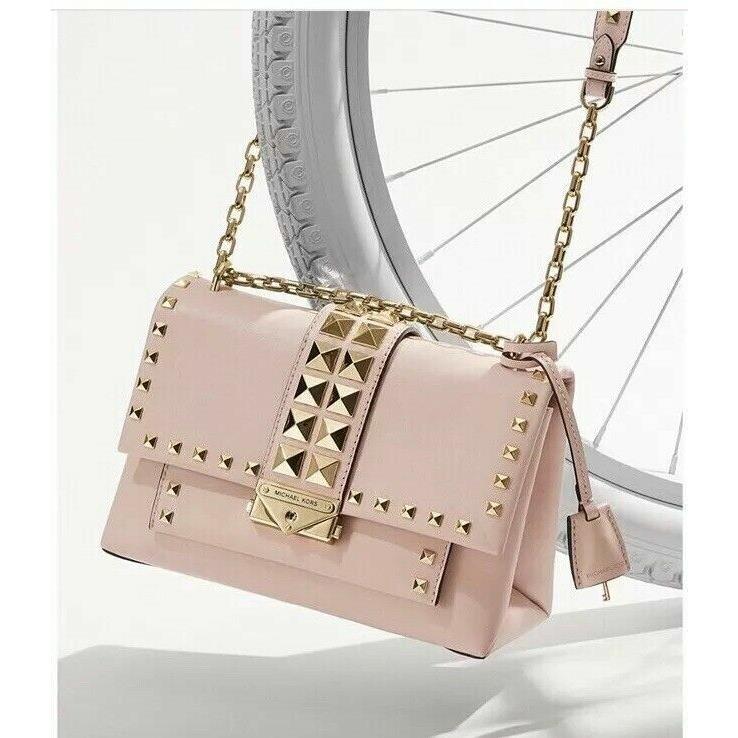 Michael kors pink studded on sale backpack