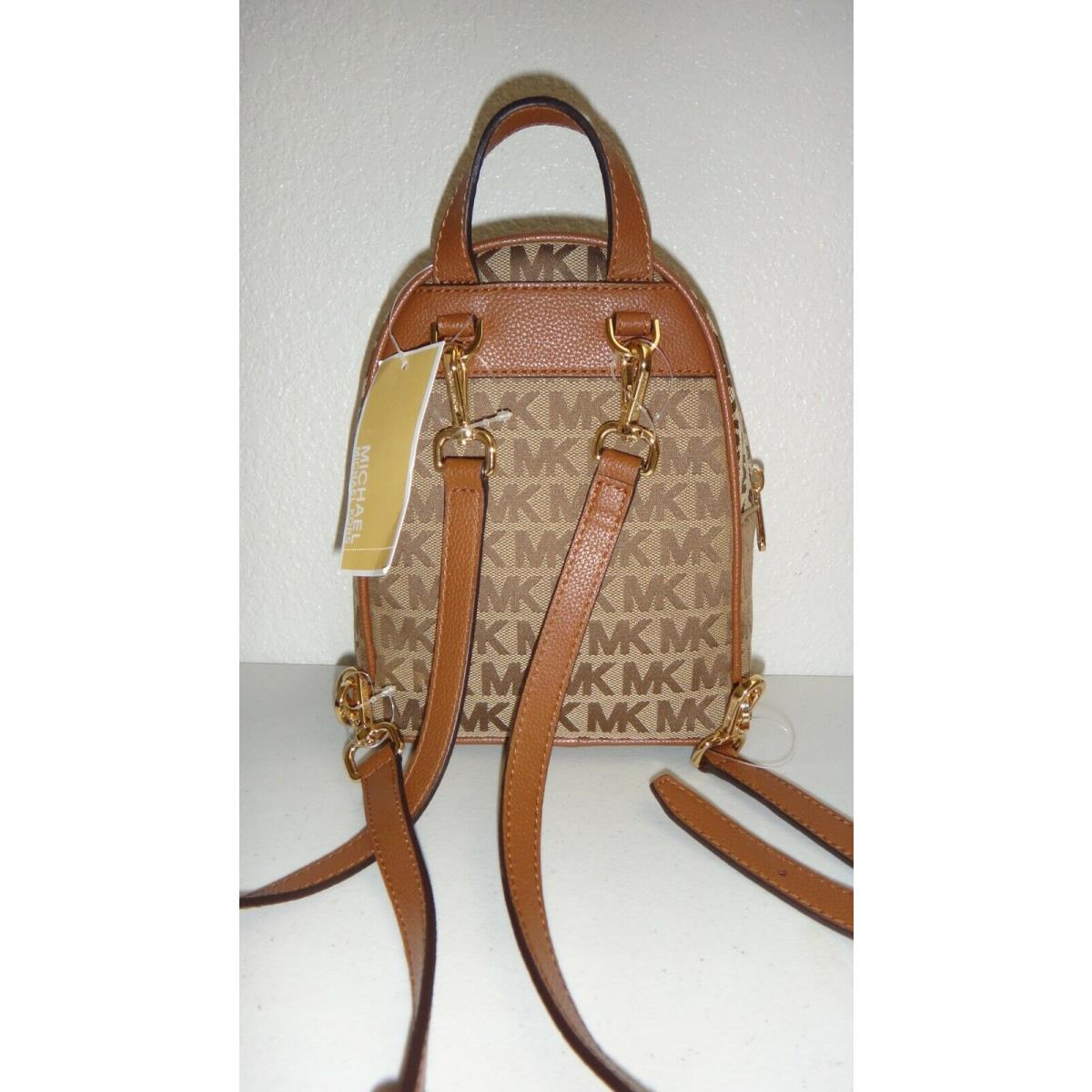 Michael Kors Abbey XS MK Signature Jacquard Zip Backpack Bag Beige Ebony  Luggage - Michael Kors bag - 007334110375 | Fash Brands
