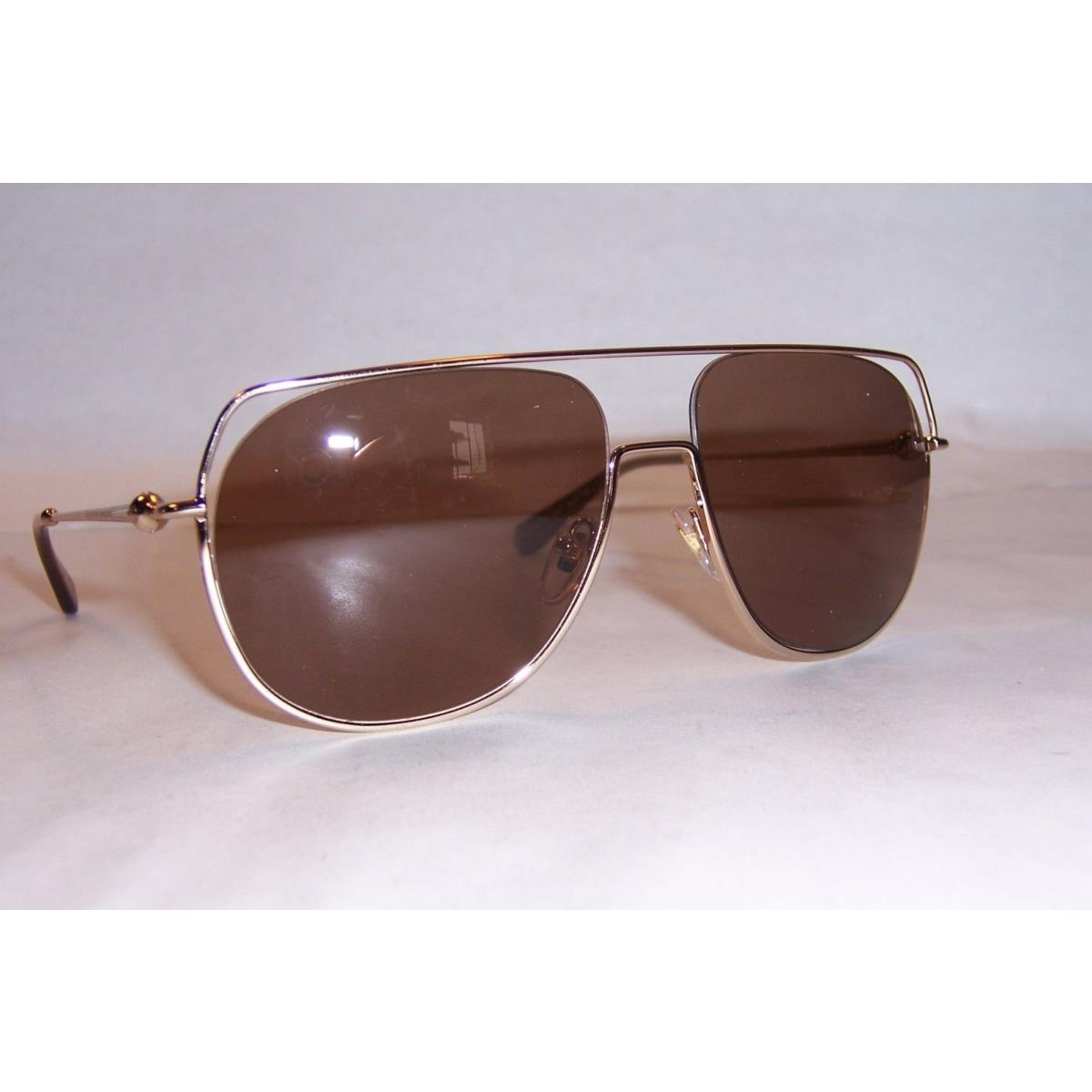 Alexander Mcqueen Sunglasses Amq 4272/S J5G-UT Gold/brown