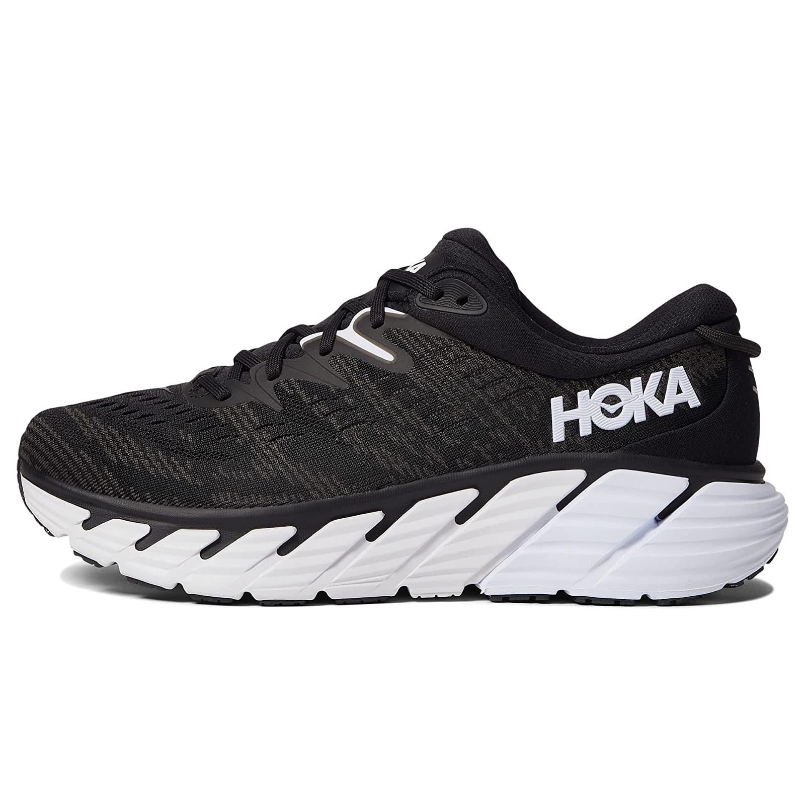 white and gold hoka shoes