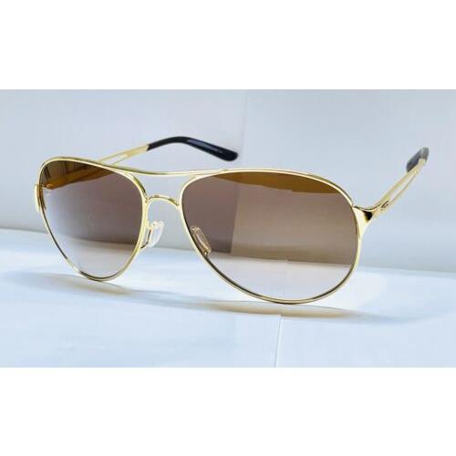 Oakley Sunglasses Caveat Polished Gold Frame Brown Gradient Lens O004054