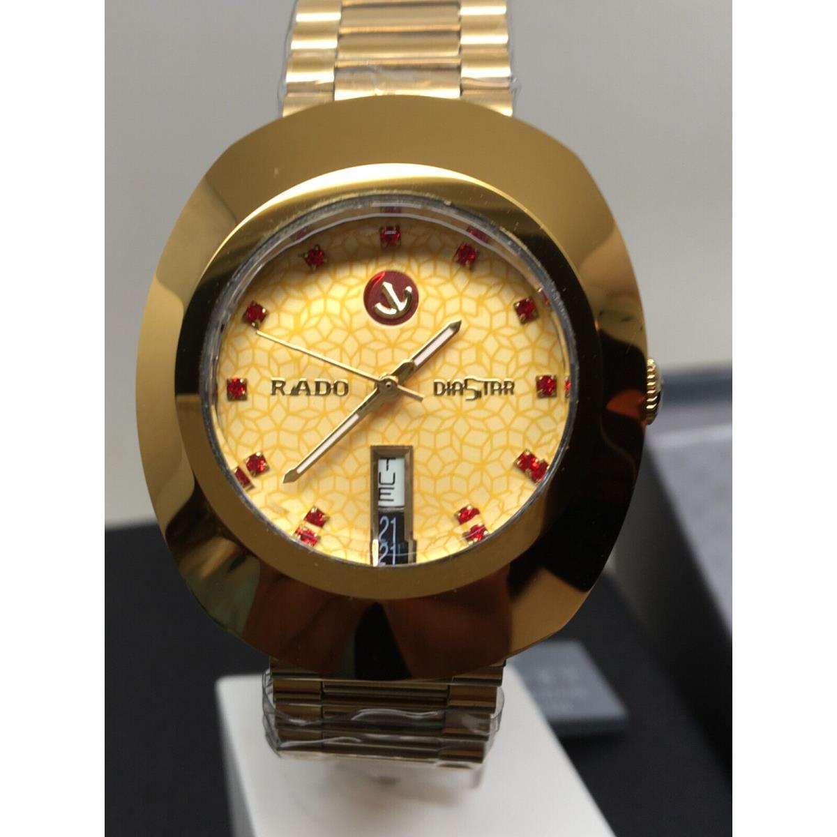 Rado Diastar R12413287 Automatic Gold Tone Red Stone Dial Watch