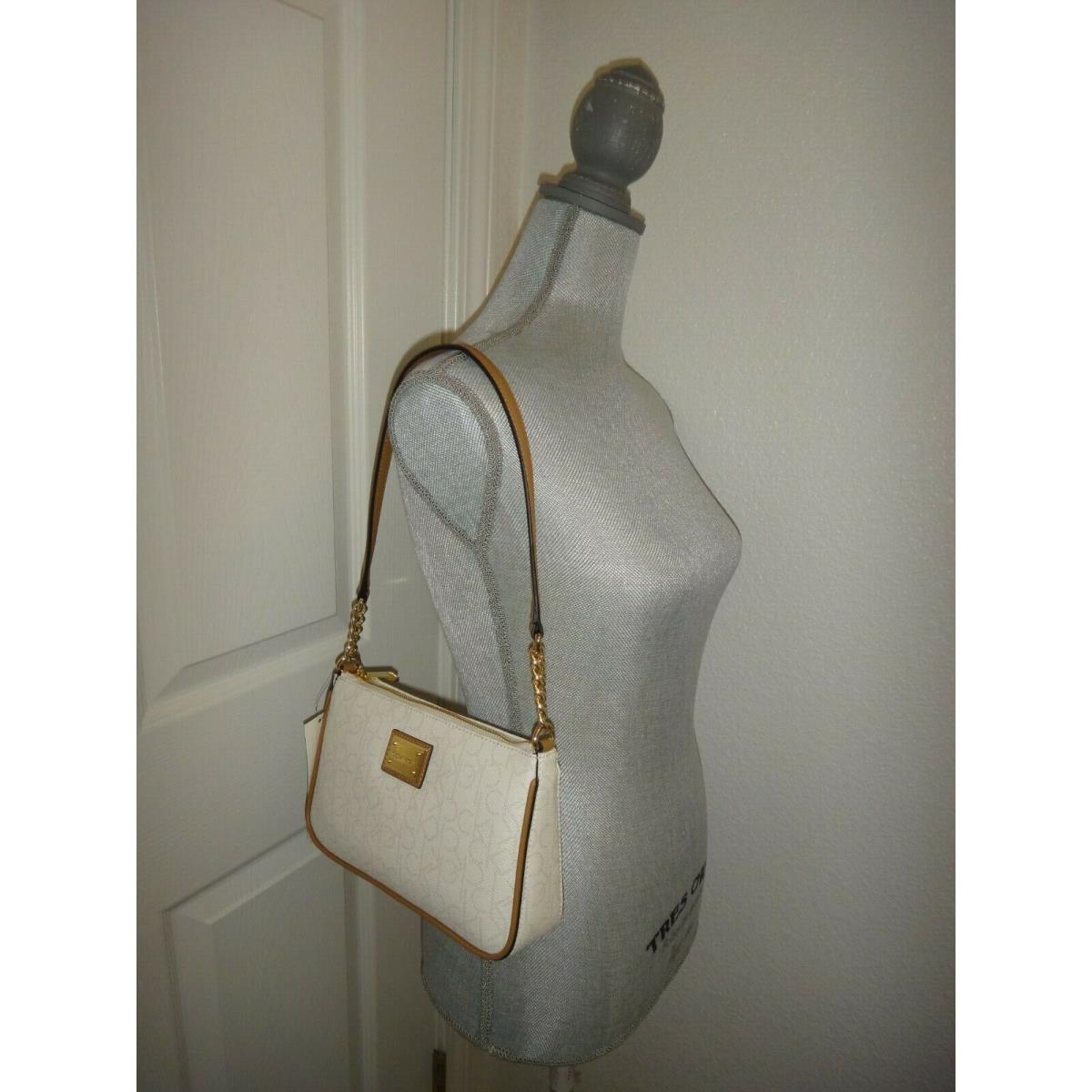 Women's Calvin Klein white and tan shoulder bag | Tan shoulder bag, Calvin  klein bag, Beige purses