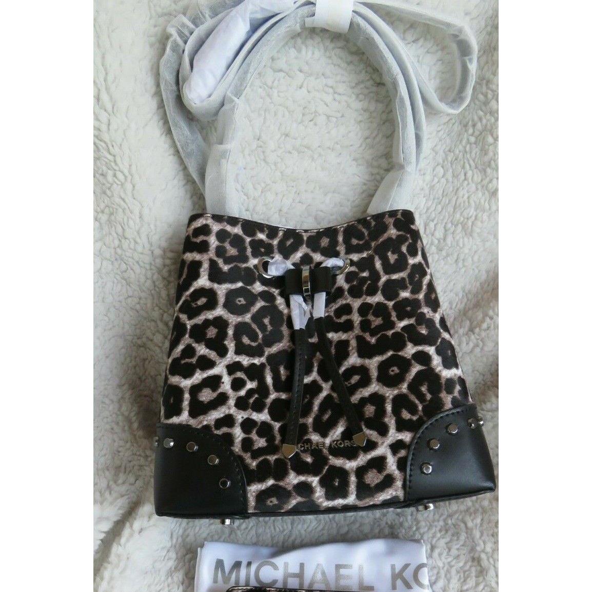 Michael Kors Mercer Gallery Rare Animal Print Shoulder /x-body Bag Wallet |  058486425138 - Michael Kors bag Mercer Gallery Bucket Bag - Black Leather  Lining, Leopard color: White/Black/multi Exterior, Gunmetal/ Darker Silver