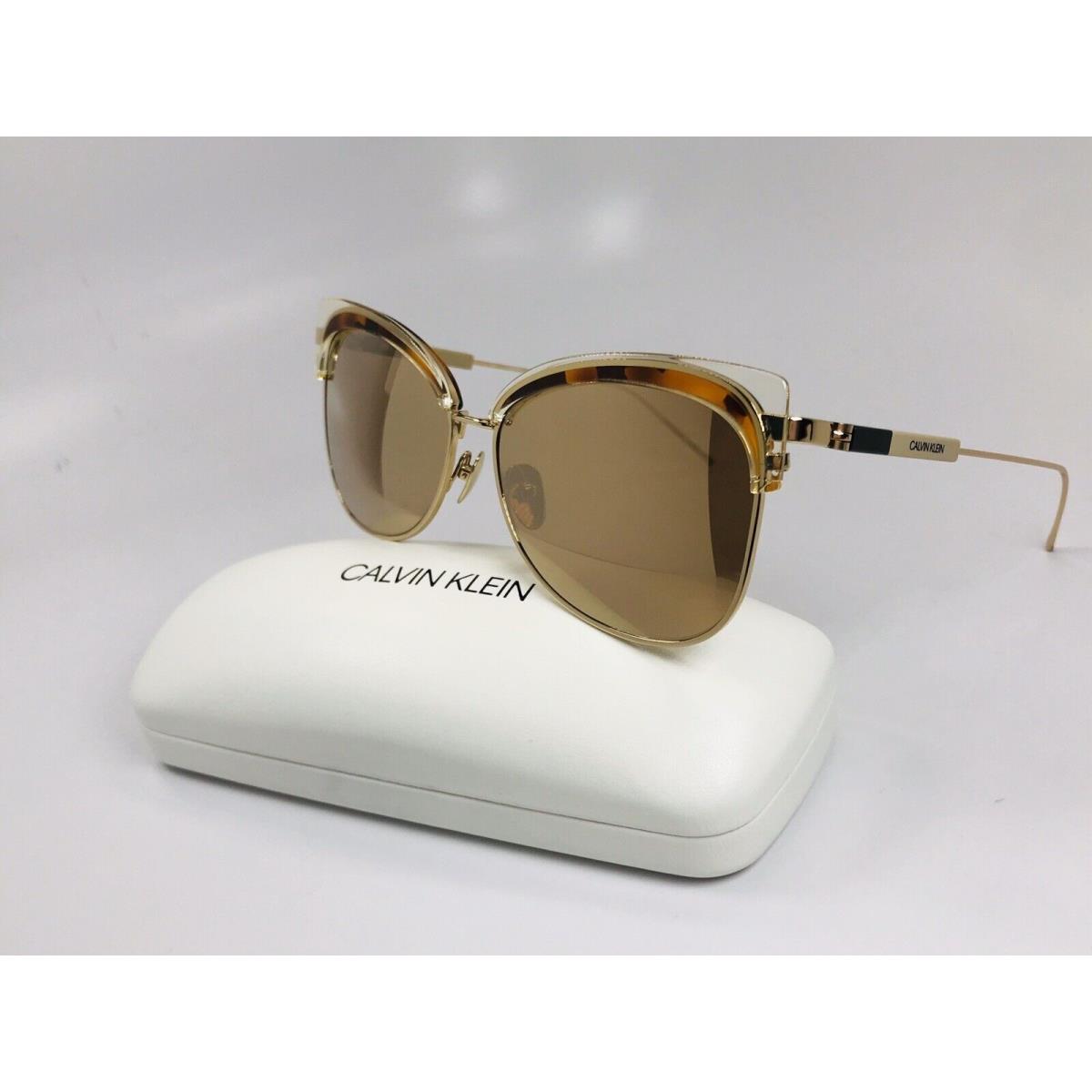 Calvin Klein CK19701S 743 Crystal Yellow Tortoise Sunglasses with Case