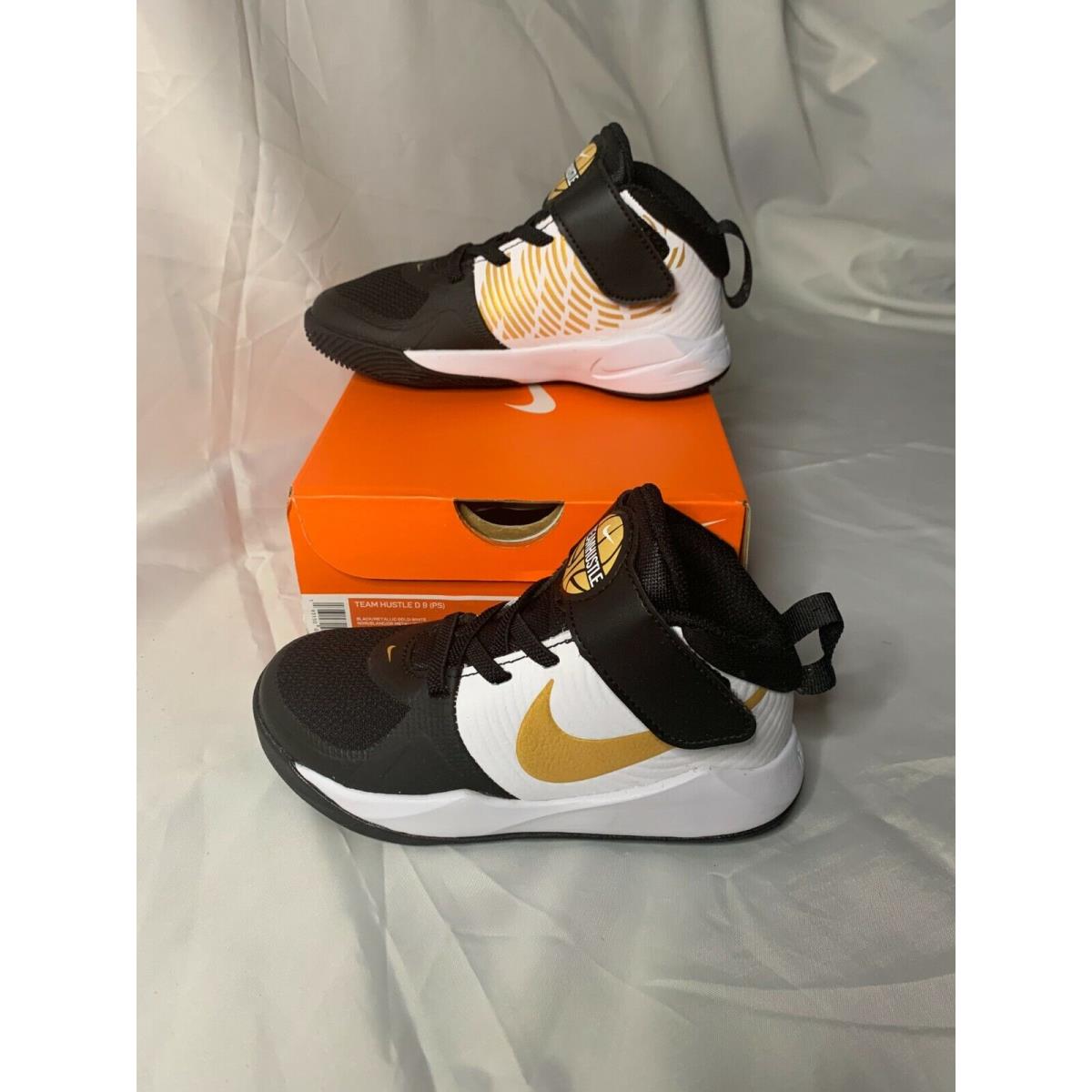 Sneakers Nike Team Hustle Shoes Men`s sz 10.5C Black Metallic Gold/white