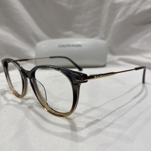 Calvin Klein eyeglasses  - Frame: Crystal Grey/brown Gradient 0