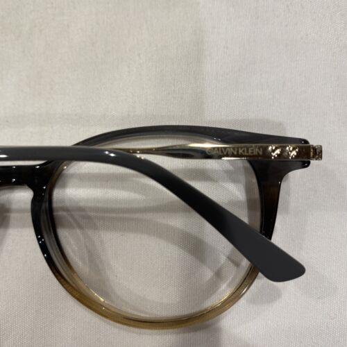 Calvin Klein eyeglasses  - Frame: Crystal Grey/brown Gradient 7
