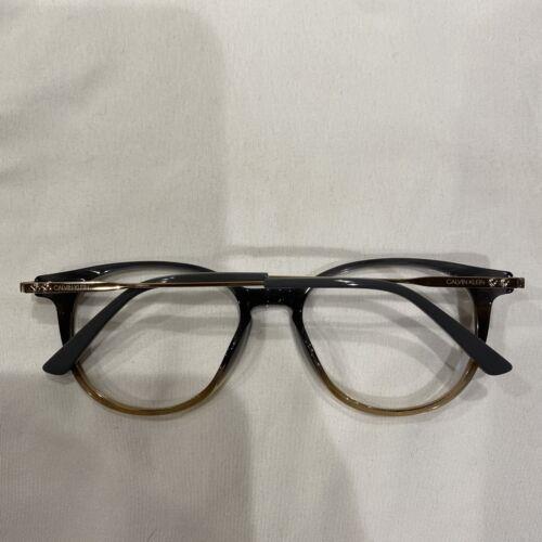 Calvin Klein eyeglasses  - Frame: Crystal Grey/brown Gradient 8