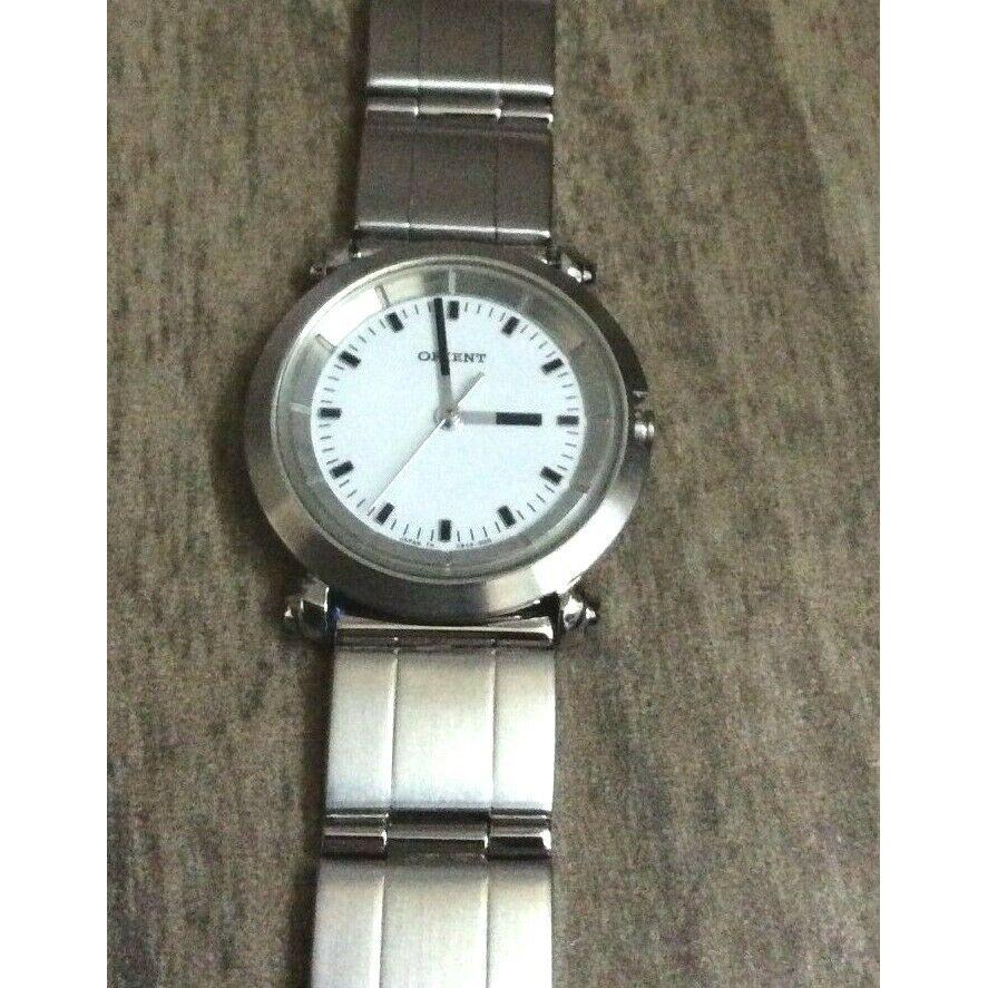 Orient Women`s Watch Round White Easy to Read Dial Silver Linked Band