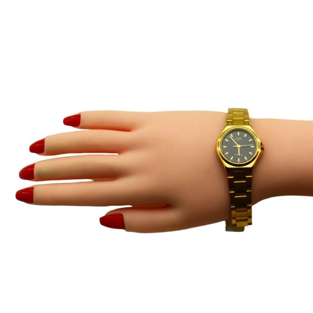 Casio Ladies Round Black Dial Yellow S. Steel Wristwatch Watch LTP1130N 1ARD