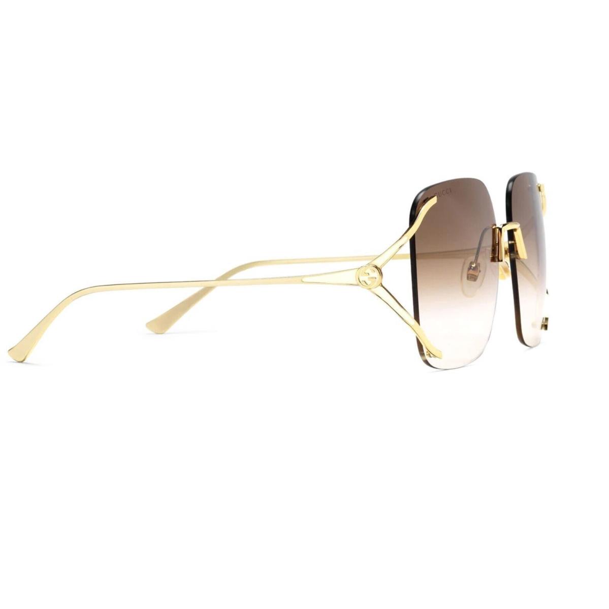 Gucci GG0646S-002 Gold Sunglasses